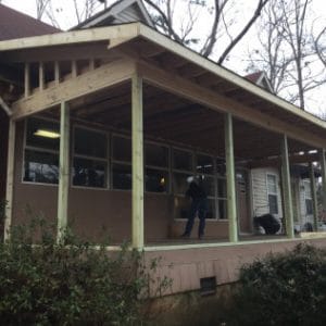 Apex worker installing new windows to a house in Sandersville, GA