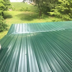 up close image of a new tin roof installed by Apex in Milledgeville, GA