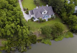 aerial view of a house on the lake